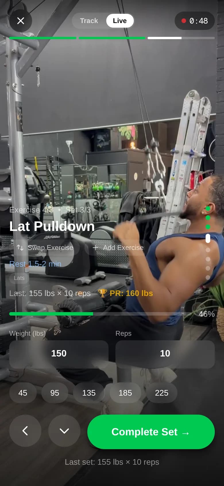 Logging a lat pulldown set in Become with the exercise demo playing behind it